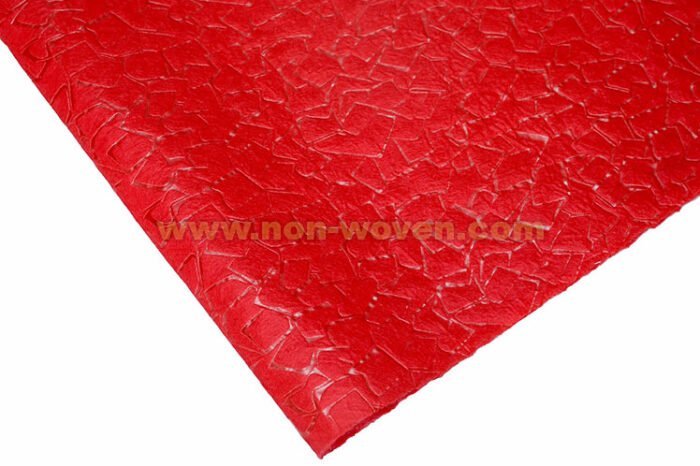 Red wrapping paper nonwoven