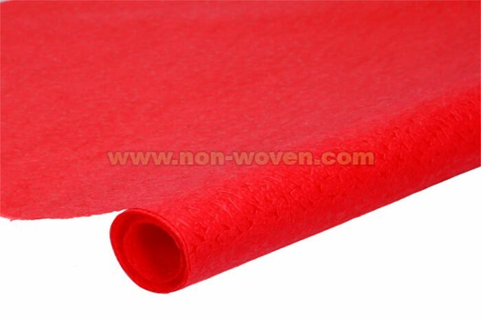 Red wrapping paper nonwoven