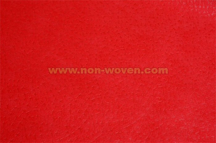 Red wrapping paper nonwoven
