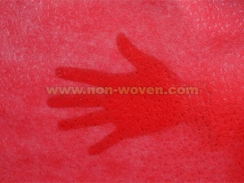 Red wrapping paper nonwoven